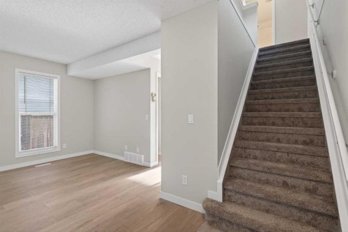 186 Harvest Rose Circle Ne, Calgary, AB - Indoor Photo Showing Other Room