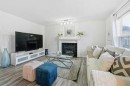 58 Bridlecrest Road Sw, Calgary, AB  - Indoor Photo Showing Living Room With Fireplace 