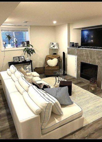 9927 Scurfield Drive Nw, Calgary, AB - Indoor With Fireplace