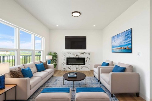 36 St Andrews Close, Lyalta, AB - Indoor Photo Showing Living Room With Fireplace