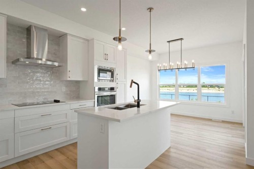 36 St Andrews Close, Lyalta, AB - Indoor Photo Showing Kitchen With Double Sink With Upgraded Kitchen