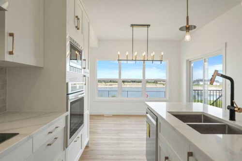 36 St Andrews Close, Lyalta, AB - Indoor Photo Showing Kitchen With Double Sink