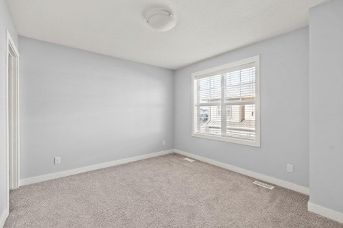 4 Evanscrest Gardens Nw, Calgary, AB - Indoor Photo Showing Other Room