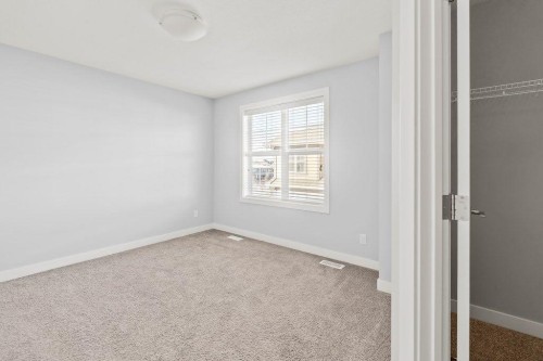 4 Evanscrest Gardens Nw, Calgary, AB - Indoor Photo Showing Other Room