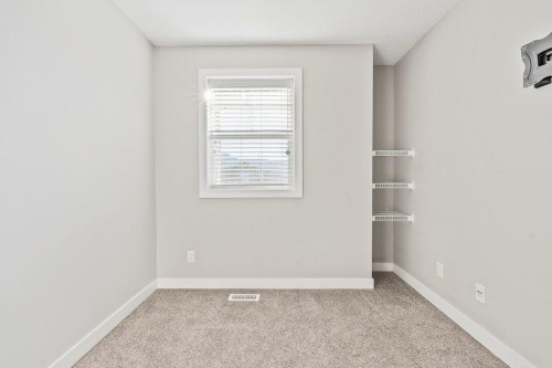 4 Evanscrest Gardens Nw, Calgary, AB - Indoor Photo Showing Other Room