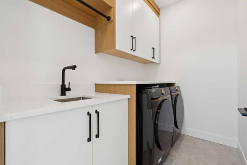 159 Lake Sylvan Close Se, Calgary, AB - Indoor Photo Showing Laundry Room