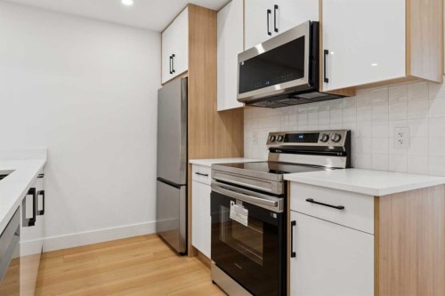 159 Lake Sylvan Close Se, Calgary, AB - Indoor Photo Showing Kitchen