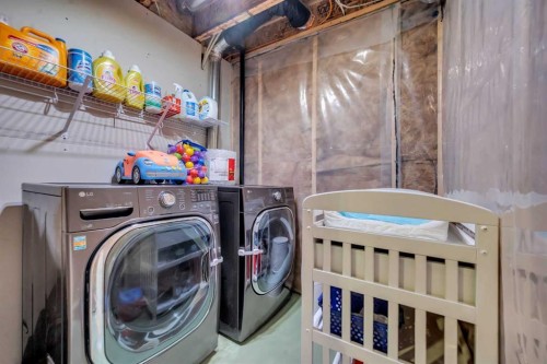 45 Nolanfield Lane Nw, Calgary, AB - Indoor Photo Showing Laundry Room
