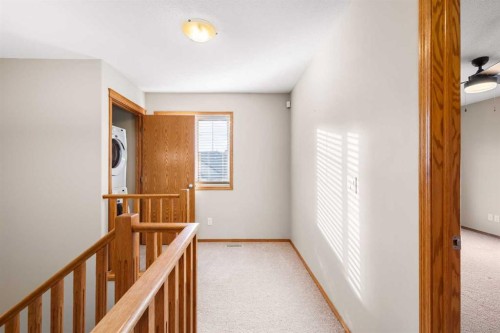 123-100 Coopers Common Sw, Airdrie, AB - Indoor Photo Showing Other Room