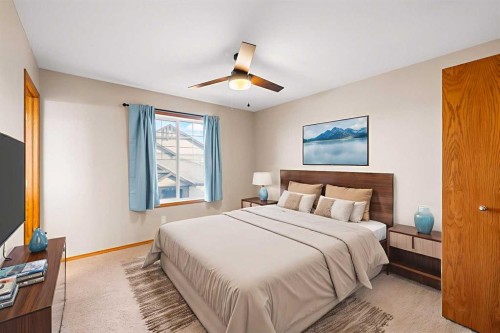 123-100 Coopers Common Sw, Airdrie, AB - Indoor Photo Showing Bedroom