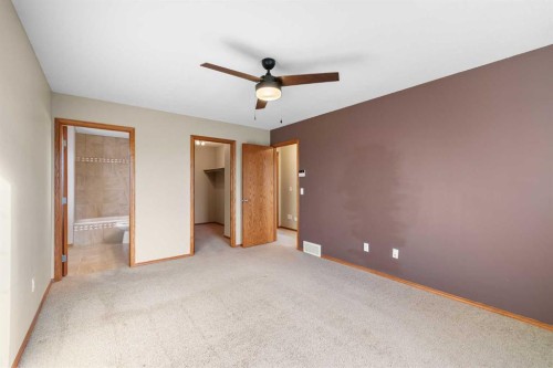 123-100 Coopers Common Sw, Airdrie, AB - Indoor Photo Showing Other Room