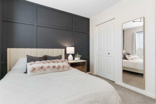 340 Kingsmere Way Se, Airdrie, AB - Indoor Photo Showing Bedroom