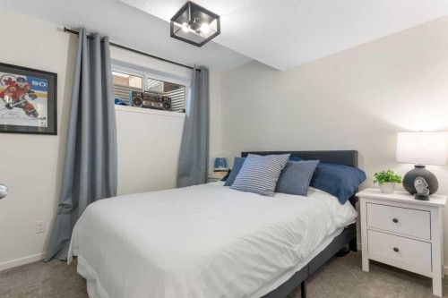 340 Kingsmere Way Se, Airdrie, AB - Indoor Photo Showing Bedroom