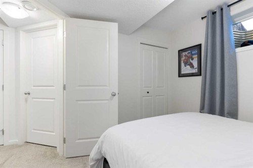 340 Kingsmere Way Se, Airdrie, AB - Indoor Photo Showing Bedroom
