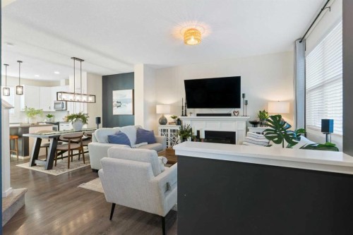 340 Kingsmere Way Se, Airdrie, AB - Indoor Photo Showing Living Room