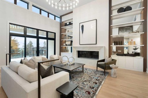 #B-4120 1A Street Sw, Calgary, AB - Indoor Photo Showing Living Room With Fireplace