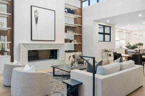 #B-4120 1A Street Sw, Calgary, AB - Indoor Photo Showing Living Room With Fireplace