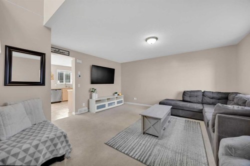 26 Saddlemead Close Ne, Calgary, AB - Indoor Photo Showing Living Room