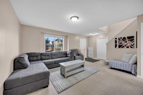 26 Saddlemead Close Ne, Calgary, AB - Indoor Photo Showing Living Room