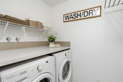 60 Walden Parade Se, Calgary, AB - Indoor Photo Showing Laundry Room