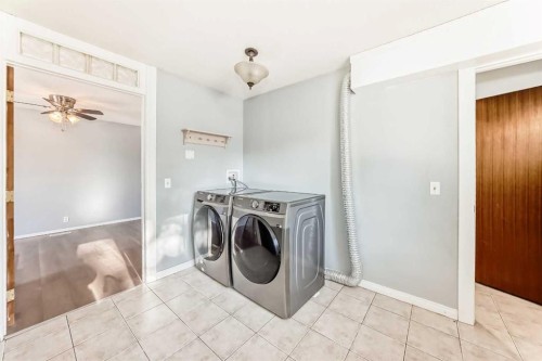 63 Falshire Place Ne, Calgary, AB - Indoor Photo Showing Laundry Room