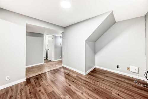 63 Falshire Place Ne, Calgary, AB - Indoor Photo Showing Other Room