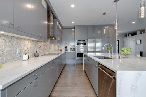 8 Cameron Close, Okotoks, AB - Indoor Photo Showing Kitchen With Stainless Steel Kitchen With Upgraded Kitchen