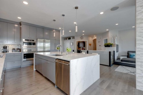 8 Cameron Close, Okotoks, AB - Indoor Photo Showing Kitchen With Stainless Steel Kitchen With Upgraded Kitchen