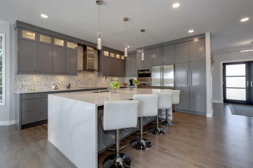 8 Cameron Close, Okotoks, AB - Indoor Photo Showing Kitchen With Upgraded Kitchen