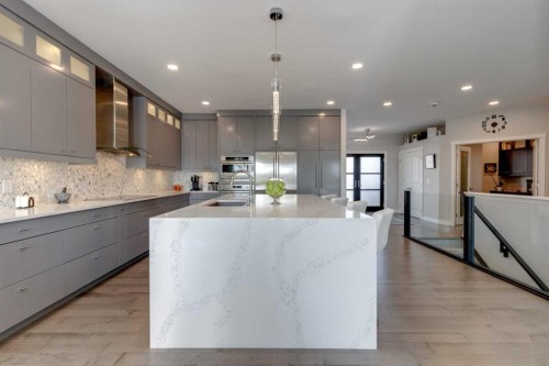 8 Cameron Close, Okotoks, AB - Indoor Photo Showing Kitchen With Upgraded Kitchen