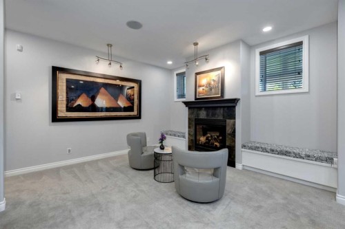 8 Cameron Close, Okotoks, AB - Indoor With Fireplace