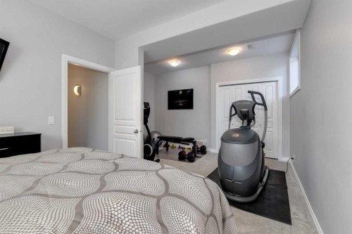 8 Cameron Close, Okotoks, AB - Indoor Photo Showing Bedroom