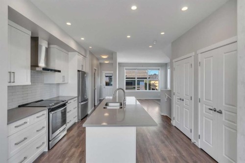 87 Masters Square Se, Calgary, AB - Indoor Photo Showing Kitchen With Stainless Steel Kitchen With Double Sink With Upgraded Kitchen