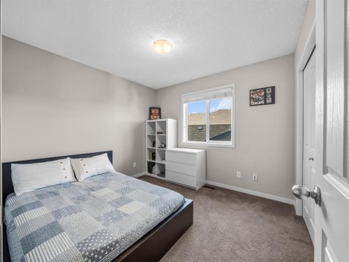 73 Cranberry Avenue Se, Calgary, AB - Indoor Photo Showing Bedroom