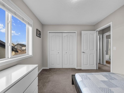 73 Cranberry Avenue Se, Calgary, AB - Indoor Photo Showing Bedroom