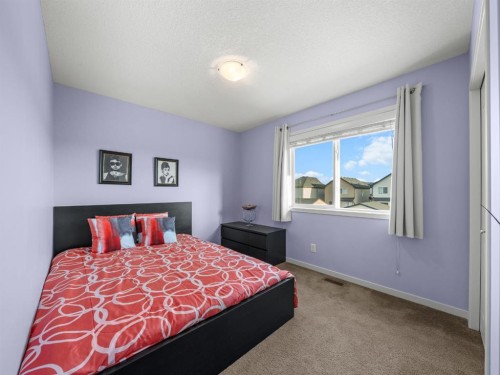 73 Cranberry Avenue Se, Calgary, AB - Indoor Photo Showing Bedroom