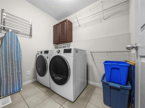 73 Cranberry Avenue Se, Calgary, AB - Indoor Photo Showing Laundry Room
