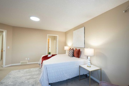 306 Rockyspring Circle Nw, Calgary, AB - Indoor Photo Showing Bedroom