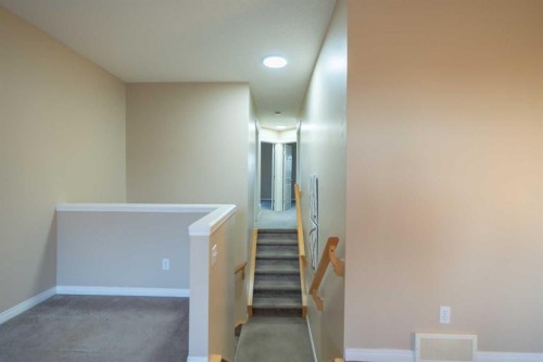 306 Rockyspring Circle Nw, Calgary, AB - Indoor Photo Showing Other Room