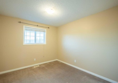 306 Rockyspring Circle Nw, Calgary, AB - Indoor Photo Showing Other Room