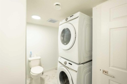 306 Rockyspring Circle Nw, Calgary, AB - Indoor Photo Showing Laundry Room