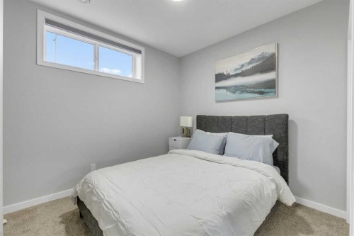 704 Creekstone Circle Sw, Calgary, AB - Indoor Photo Showing Bedroom