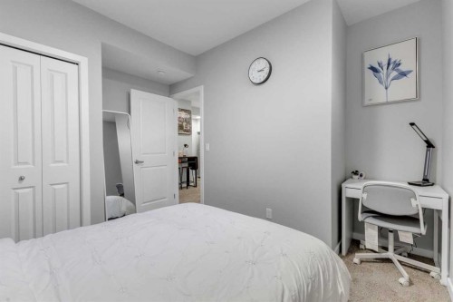 704 Creekstone Circle Sw, Calgary, AB - Indoor Photo Showing Bedroom