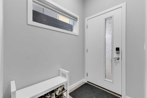 704 Creekstone Circle Sw, Calgary, AB - Indoor Photo Showing Other Room