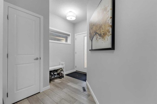 704 Creekstone Circle Sw, Calgary, AB - Indoor Photo Showing Other Room