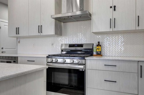 704 Creekstone Circle Sw, Calgary, AB - Indoor Photo Showing Kitchen With Upgraded Kitchen