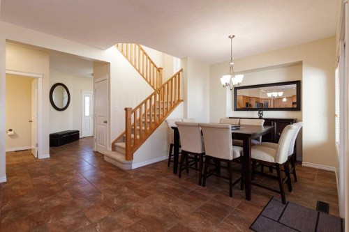 116 Rainbow Falls Grove, Chestermere, AB - Indoor Photo Showing Dining Room