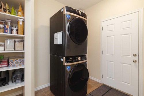 116 Rainbow Falls Grove, Chestermere, AB - Indoor Photo Showing Laundry Room