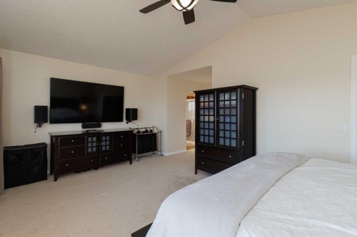 116 Rainbow Falls Grove, Chestermere, AB - Indoor Photo Showing Bedroom