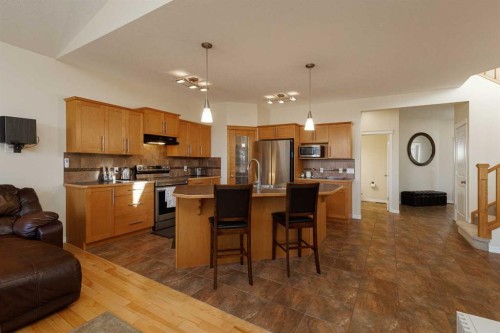 116 Rainbow Falls Grove, Chestermere, AB - Indoor Photo Showing Kitchen With Stainless Steel Kitchen